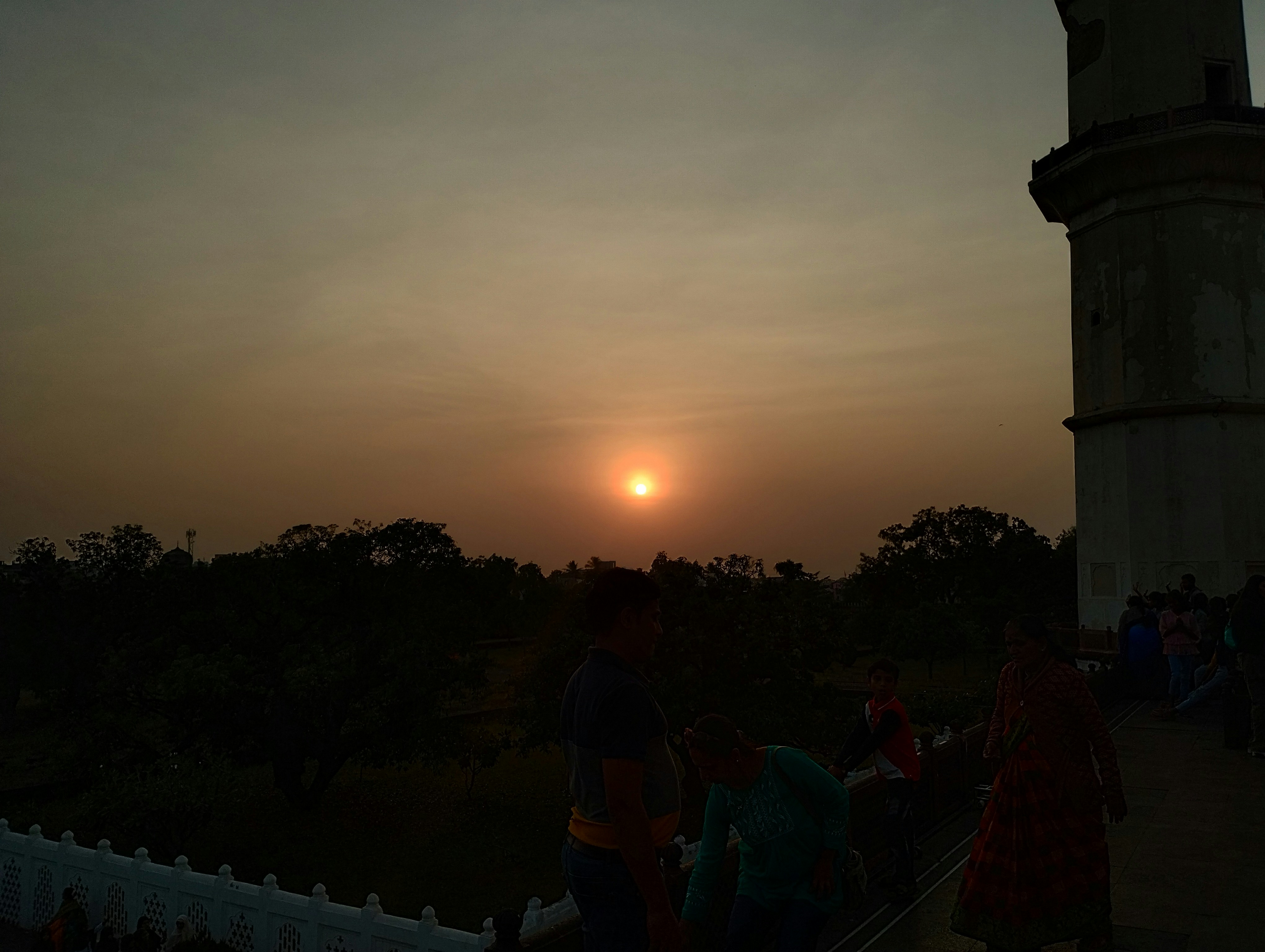 Group of travelers at lighthouse