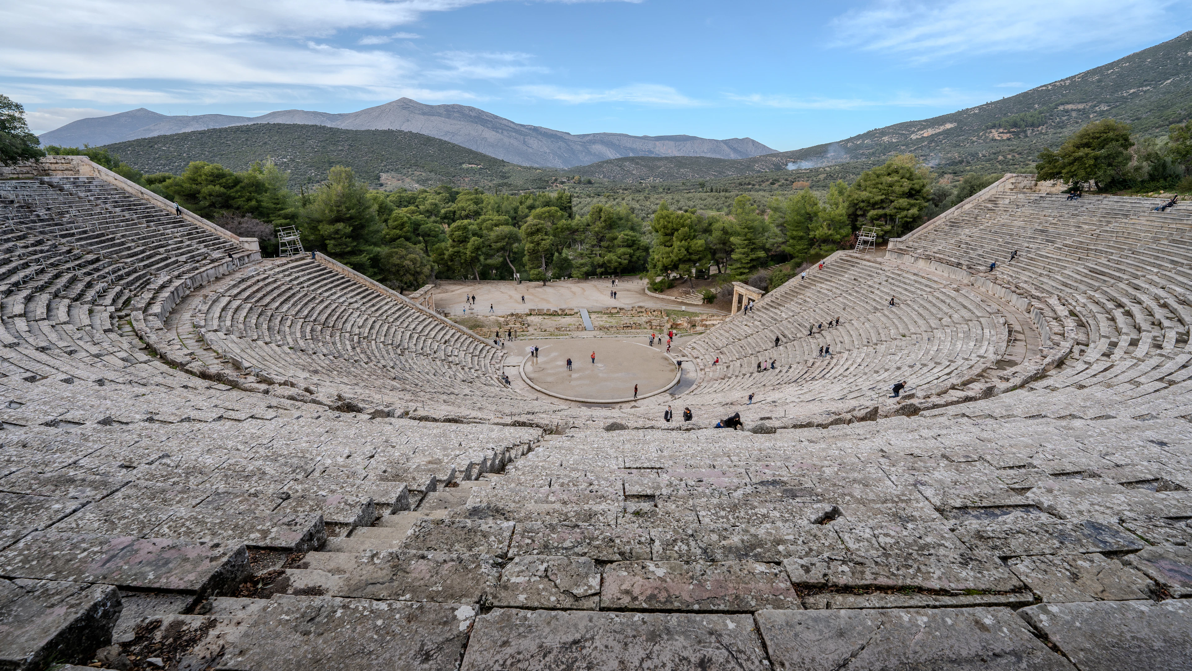 The ancient theatre of Epidaurus among wooded hills