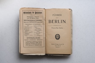 a book opened on top of a table