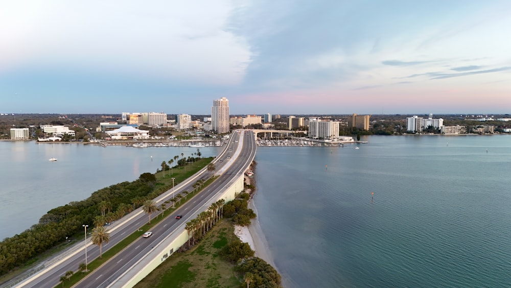 an aerial view of a city and a body of water