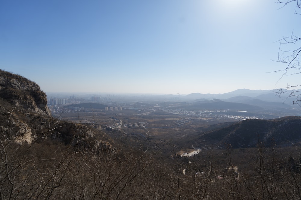 a view of a city from the top of a mountain