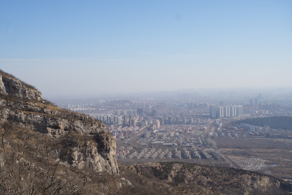 a view of a city from the top of a mountain