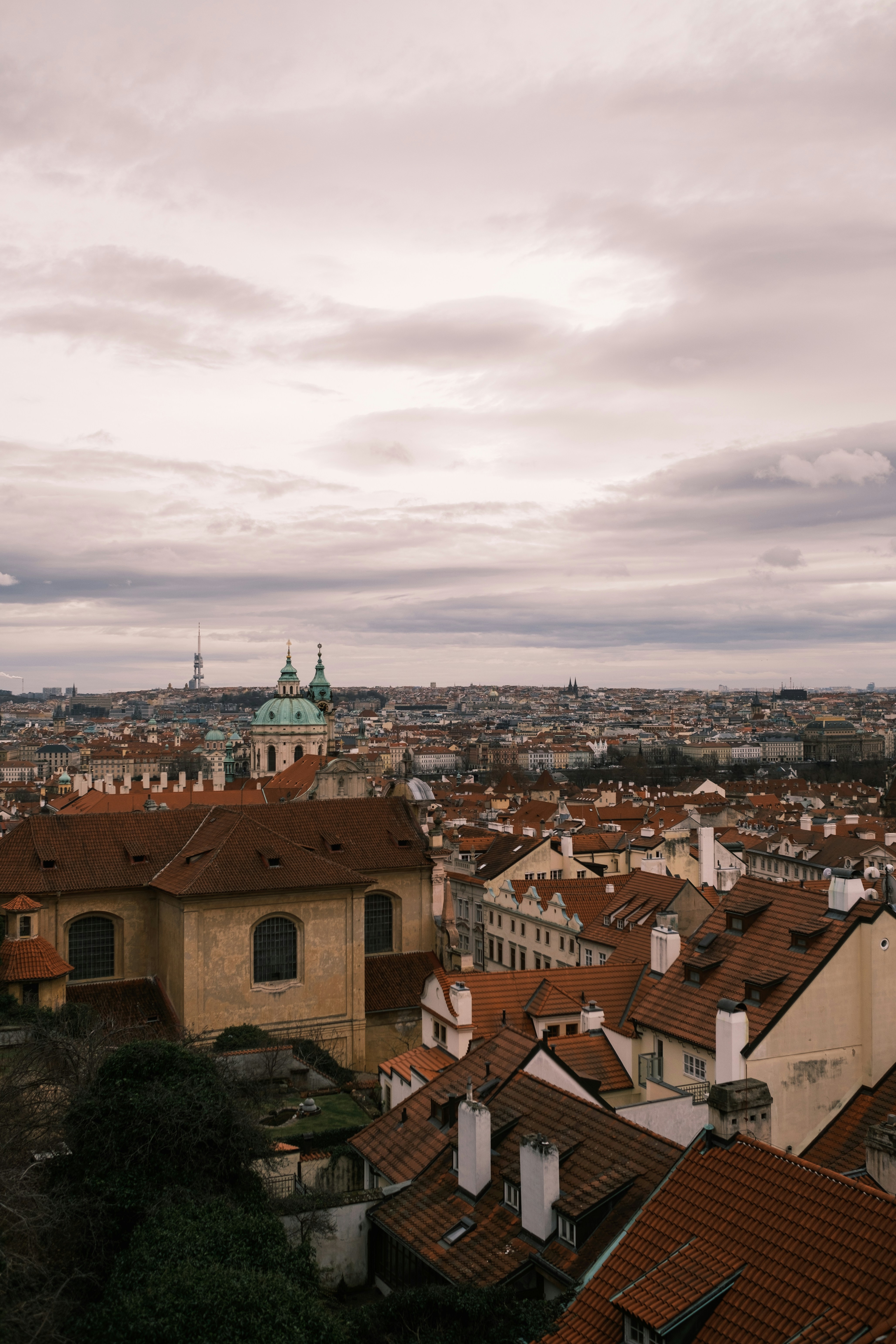 a view of a city from the top of a hill