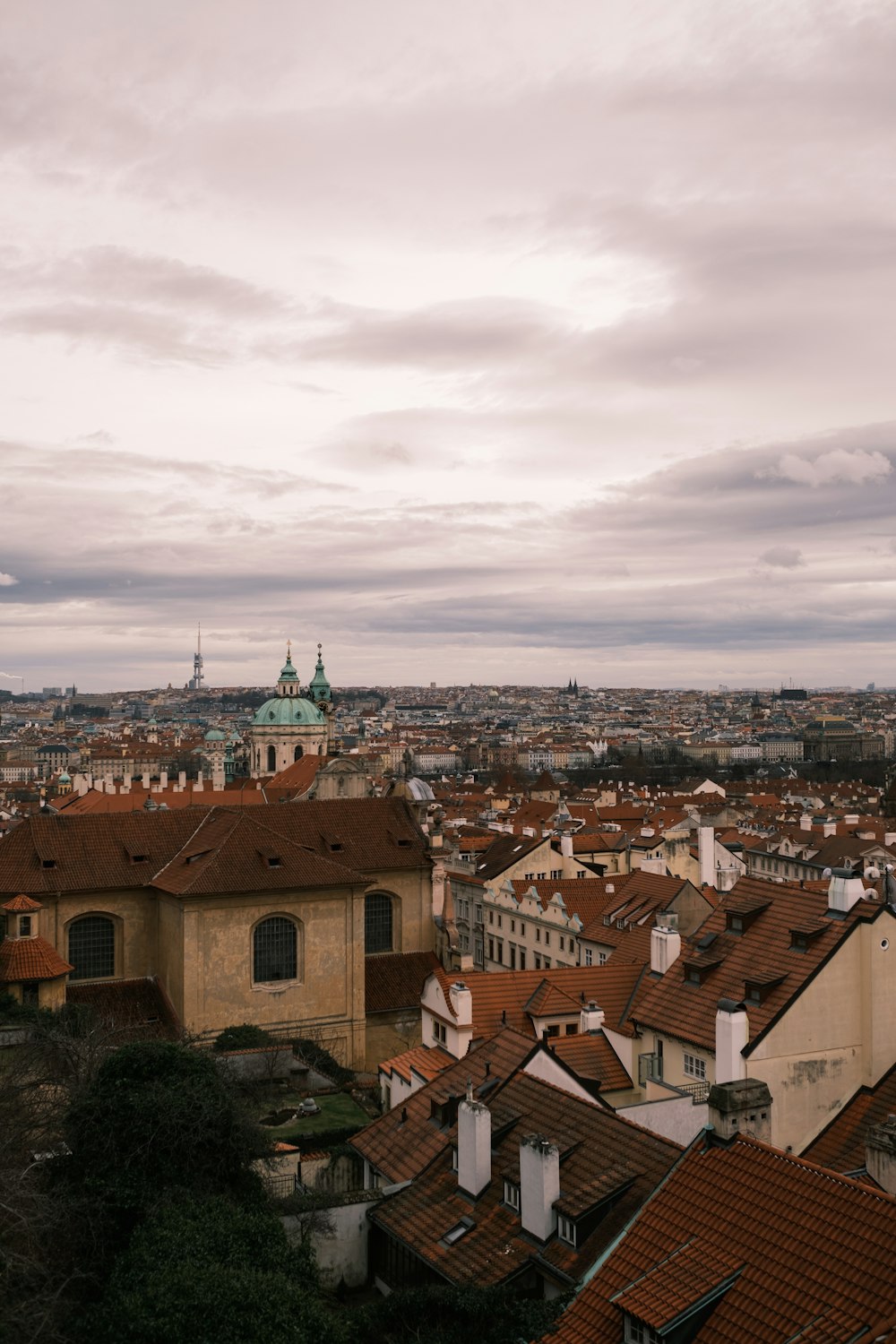 a view of a city from the top of a hill