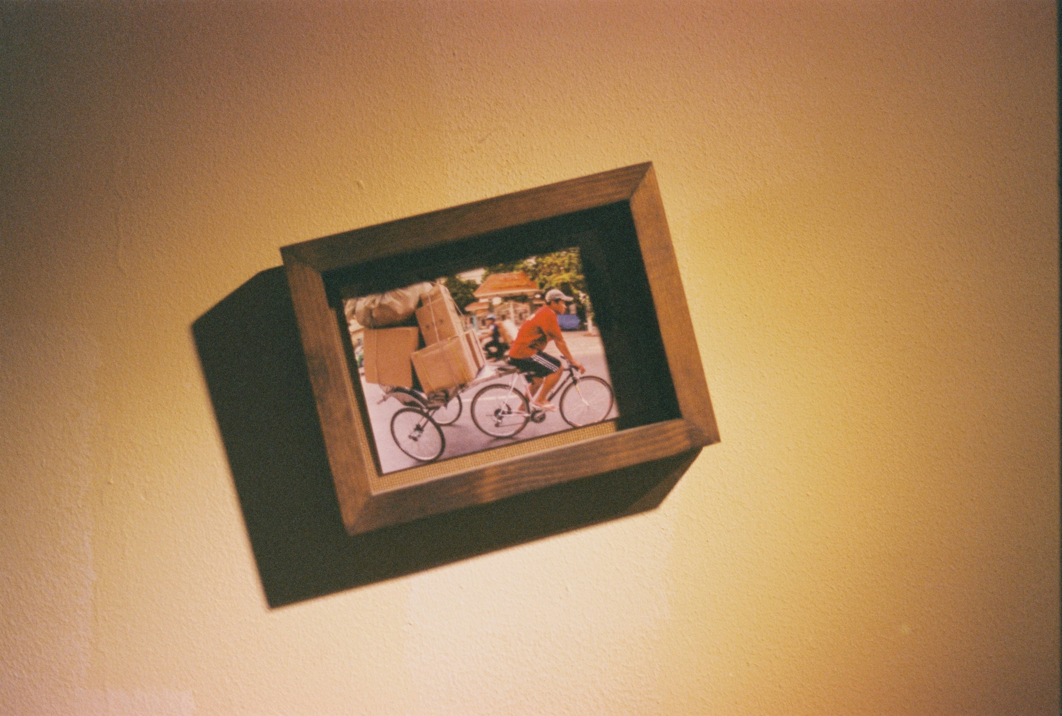 a picture of a man riding a bike on a wall