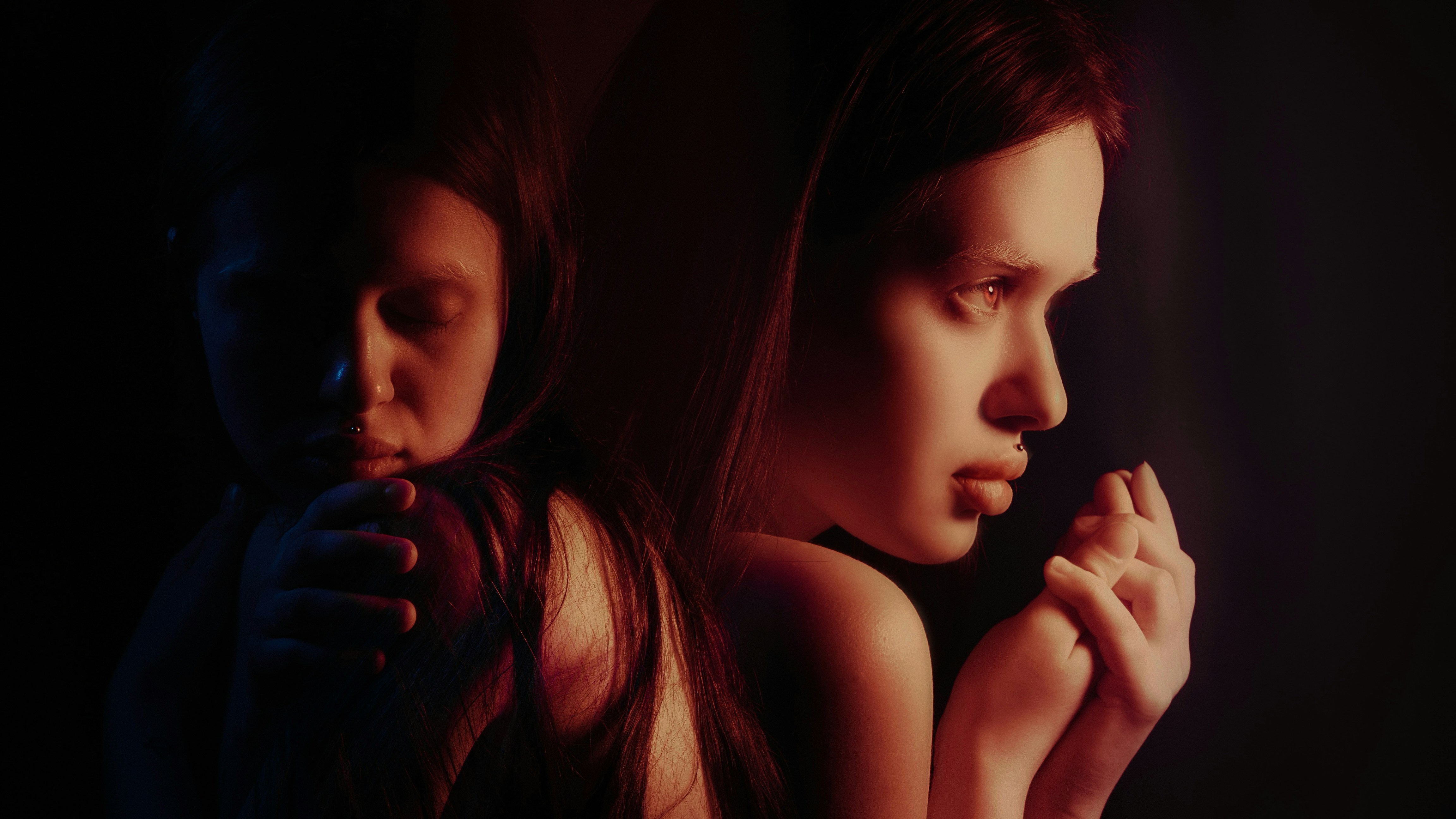 a couple of women standing next to each other