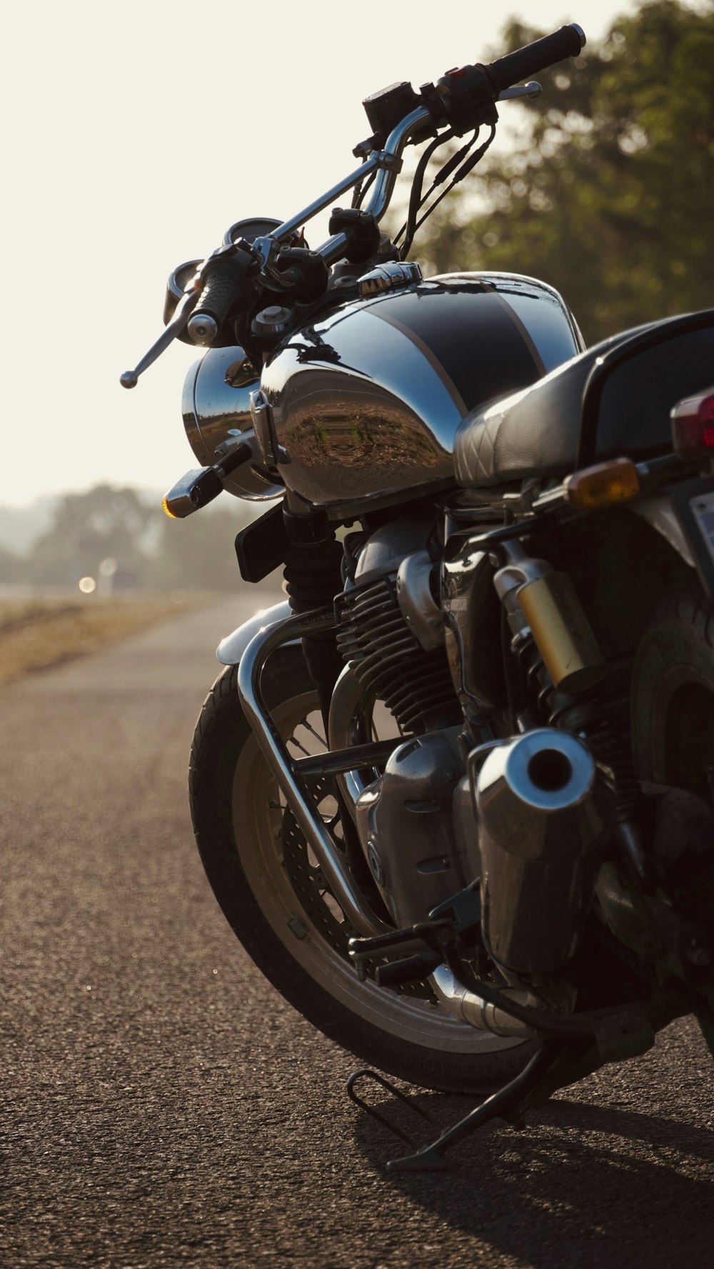 a motorcycle parked on the side of the road