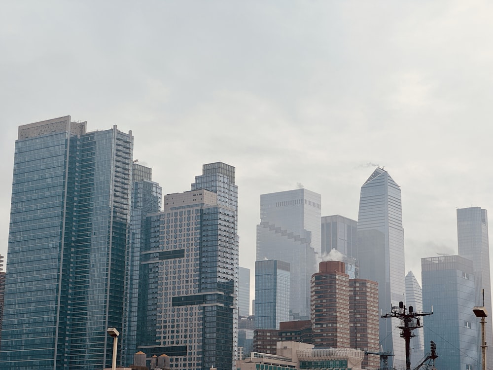 a group of tall buildings in a city