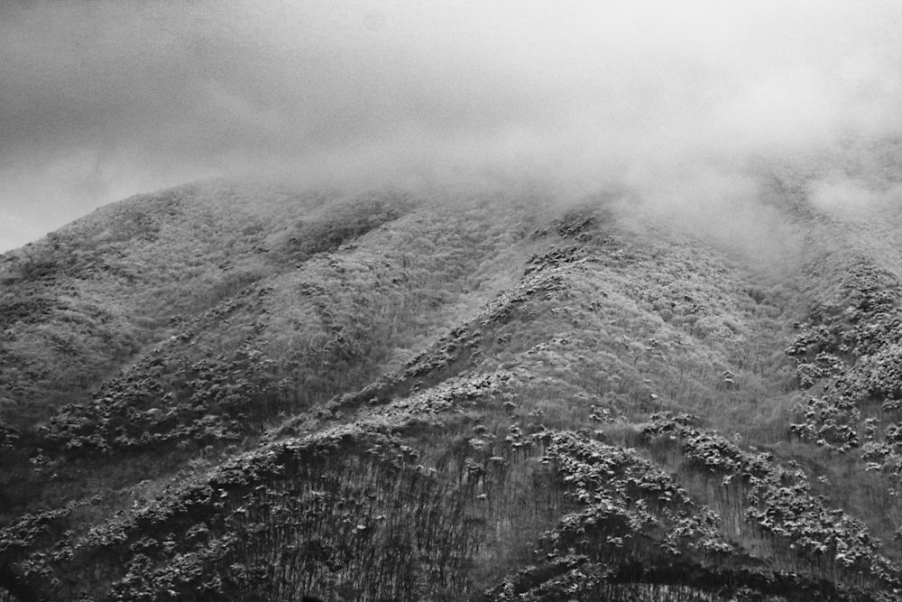 a black and white photo of a mountain