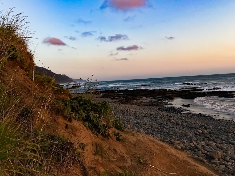 a view of the ocean from a cliff