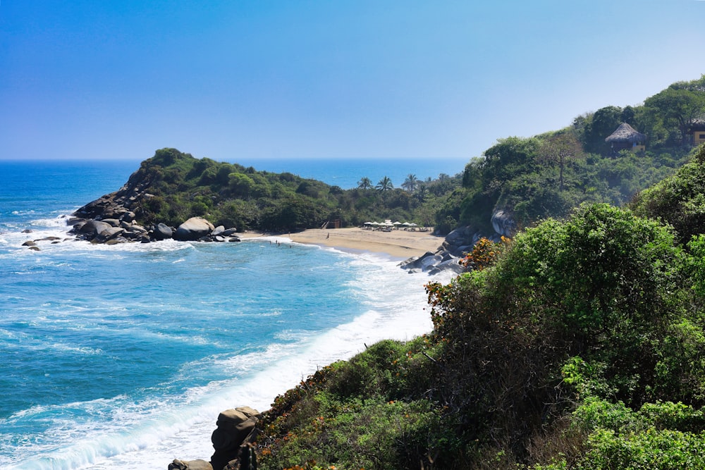 a view of a beach from a cliff