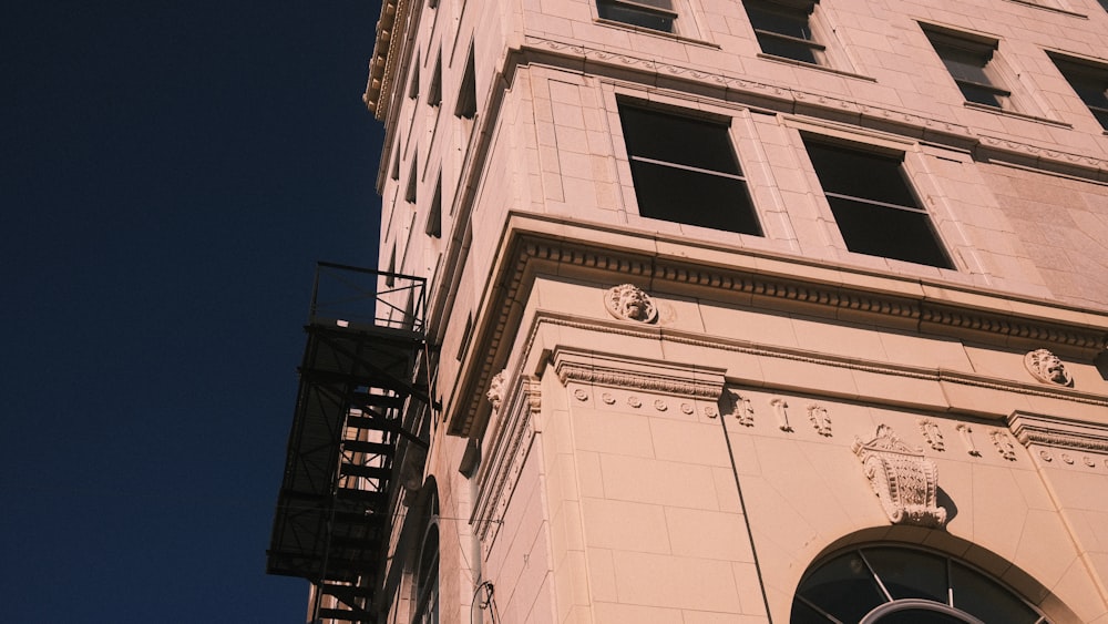 a tall building with a clock on the front of it