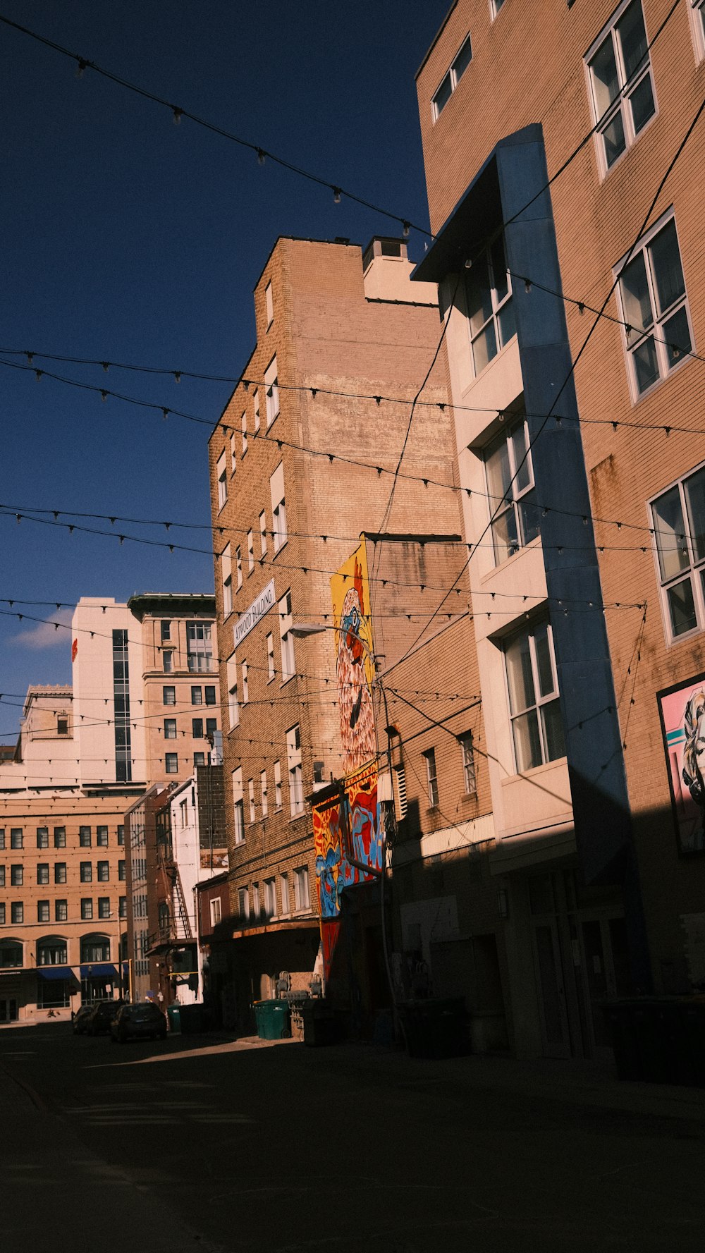 a city street with a bunch of buildings in the background