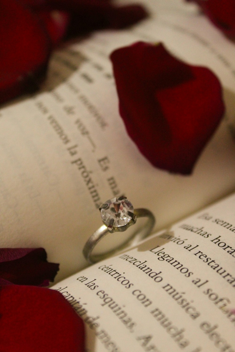 a close up of a ring on a book