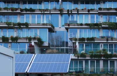 a building with a bunch of windows and a ladder