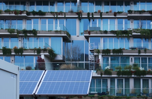 a building with a bunch of windows and a ladder