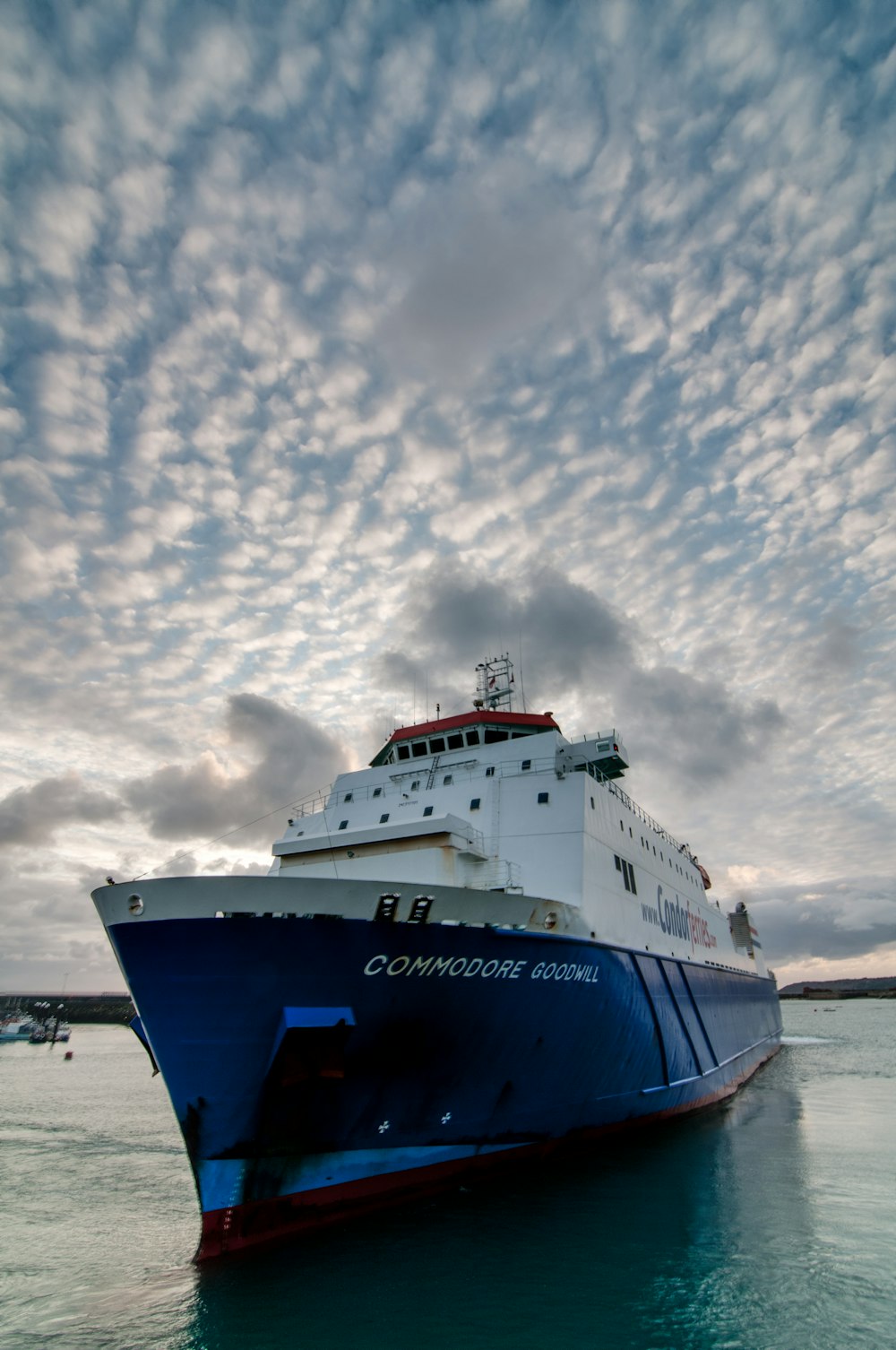 a large boat floating on top of a body of water