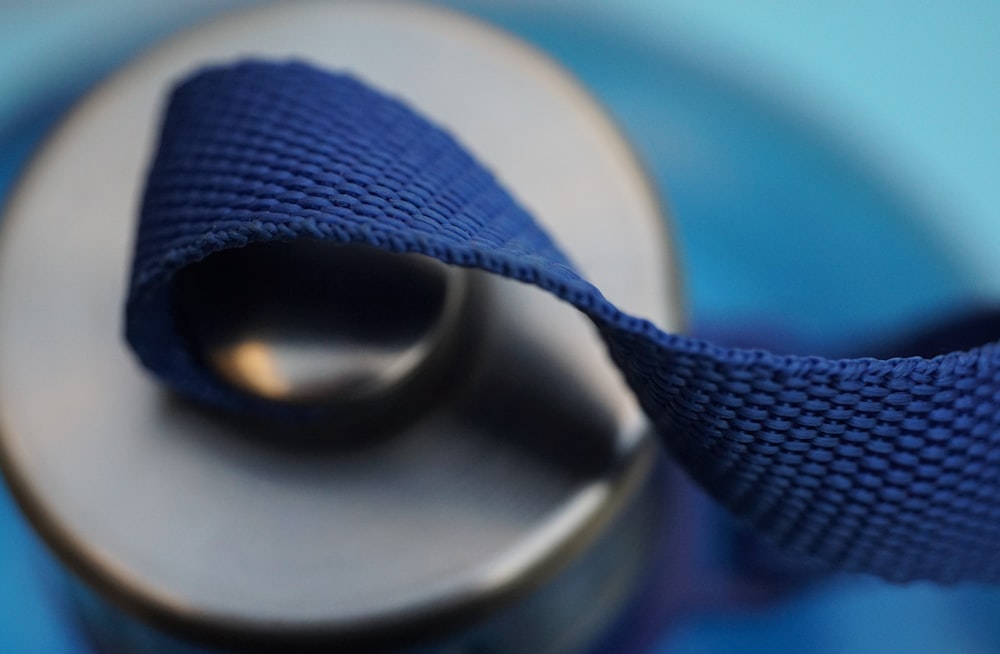 a metal object with a blue cloth on top of it