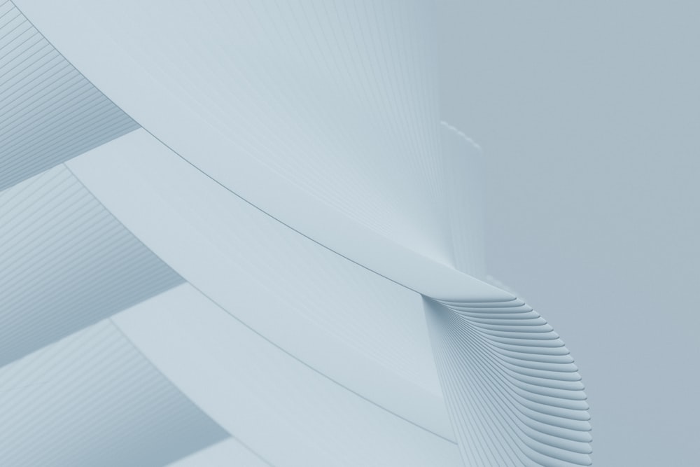 a close up of a white wall with wavy lines