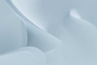an abstract white background with a curved curve