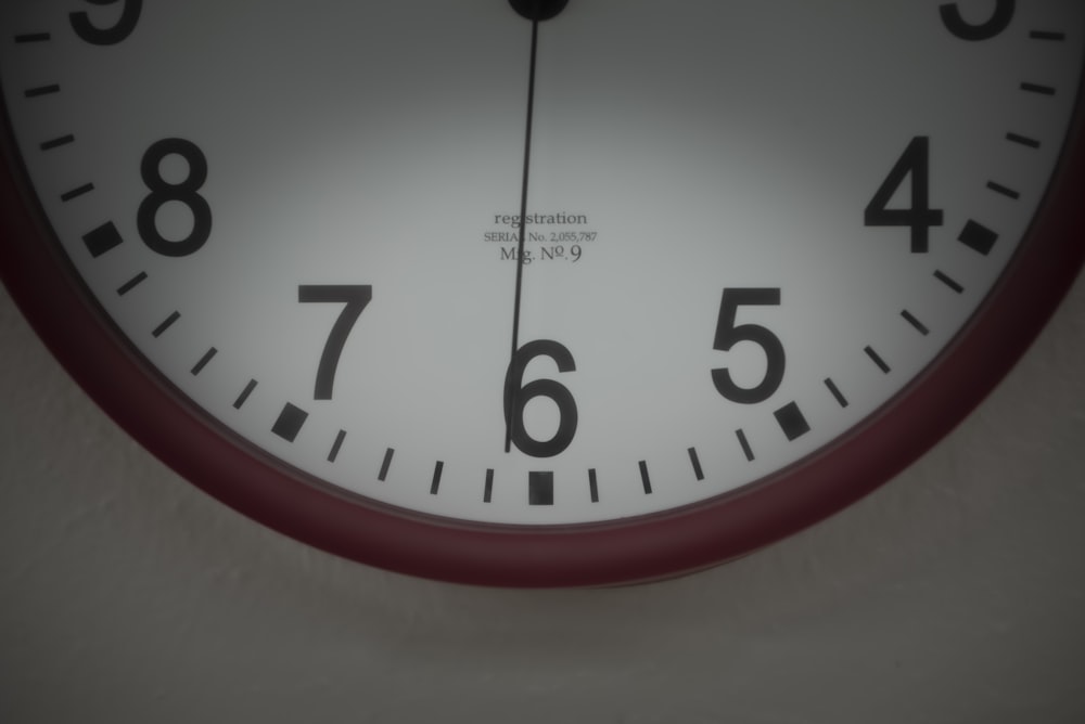 a close up of a clock face showing the time