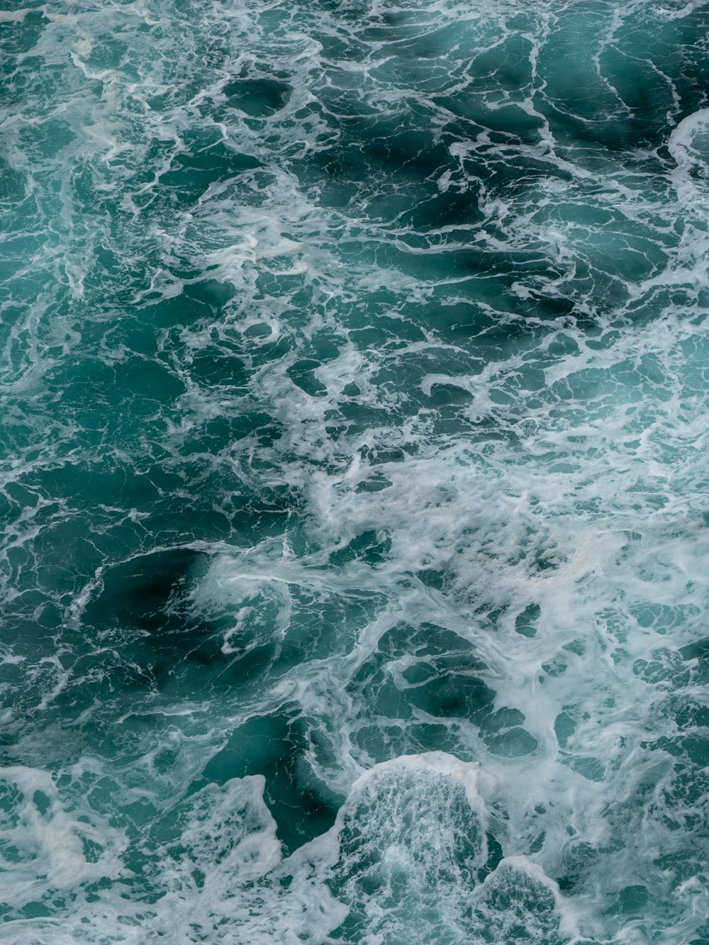 a large body of water covered in lots of waves