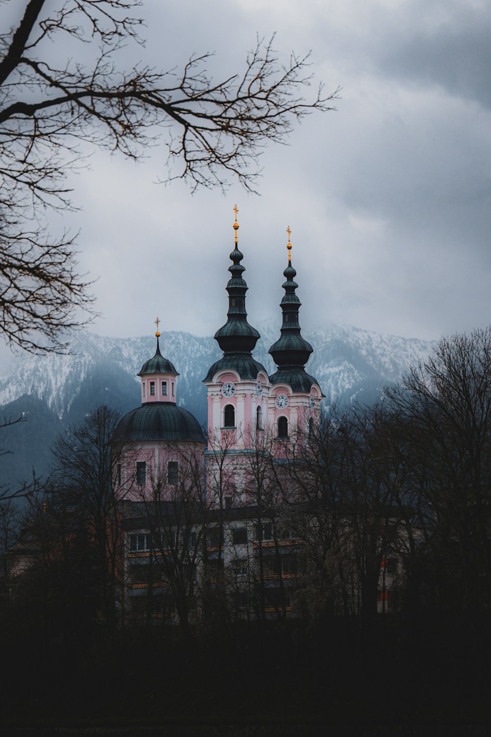 a large building with two towers on top of it