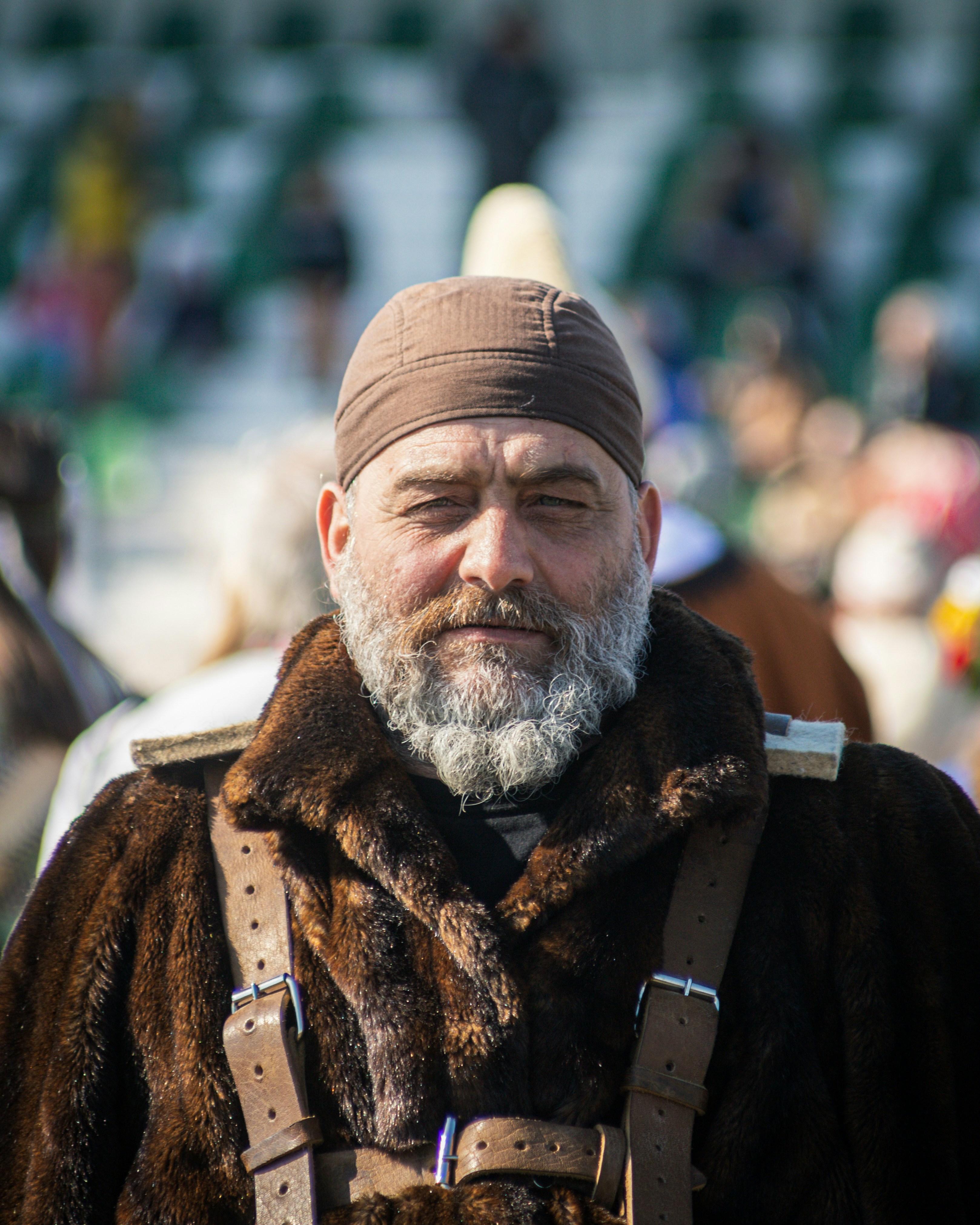 A man with a beard wearing a brown hat