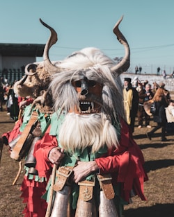 A group of people in costume with horns and horns