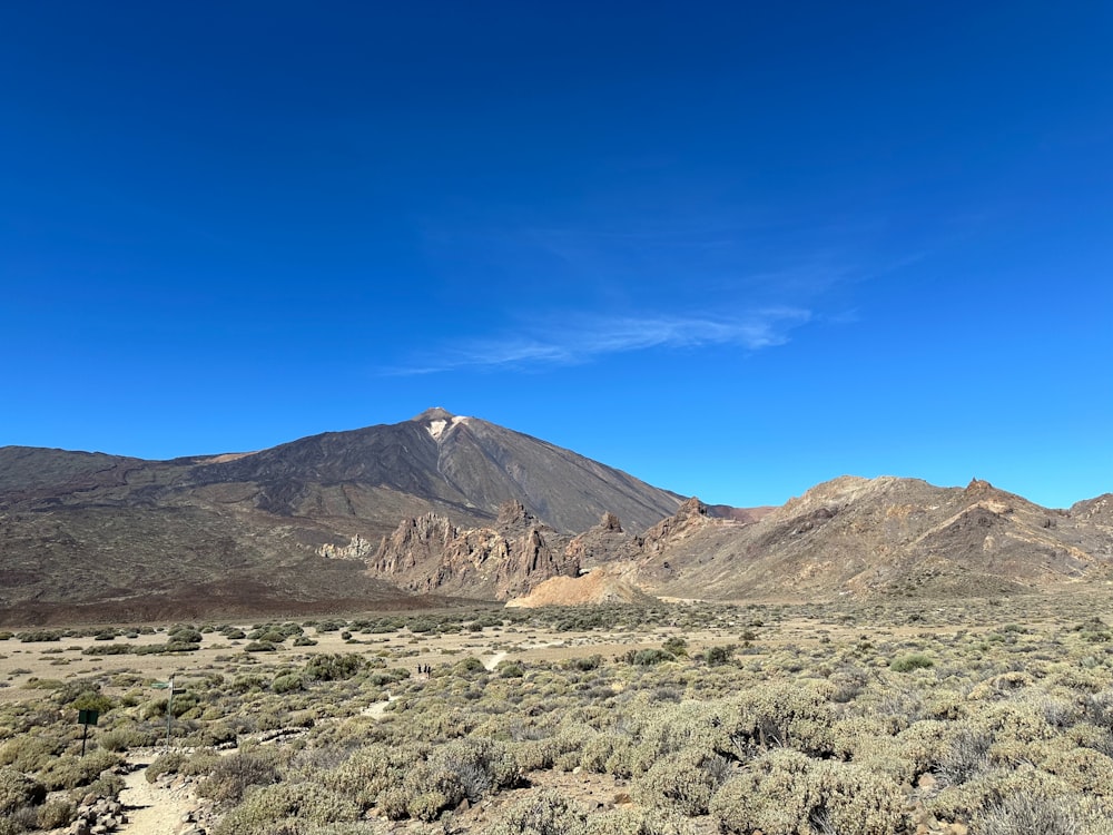 a view of a mountain range in the desert