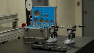 a couple of machines sitting on top of a table