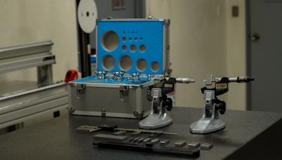 a couple of machines sitting on top of a table