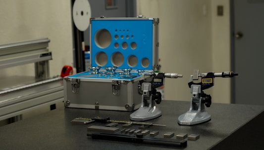 a couple of machines sitting on top of a table