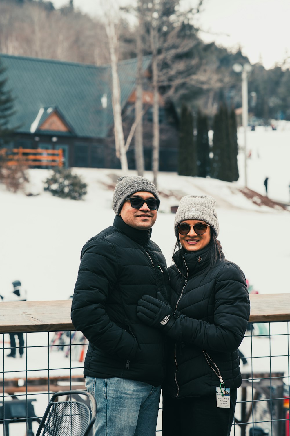 a man and a woman standing next to each other