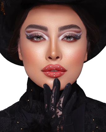 a woman wearing a black hat and gloves