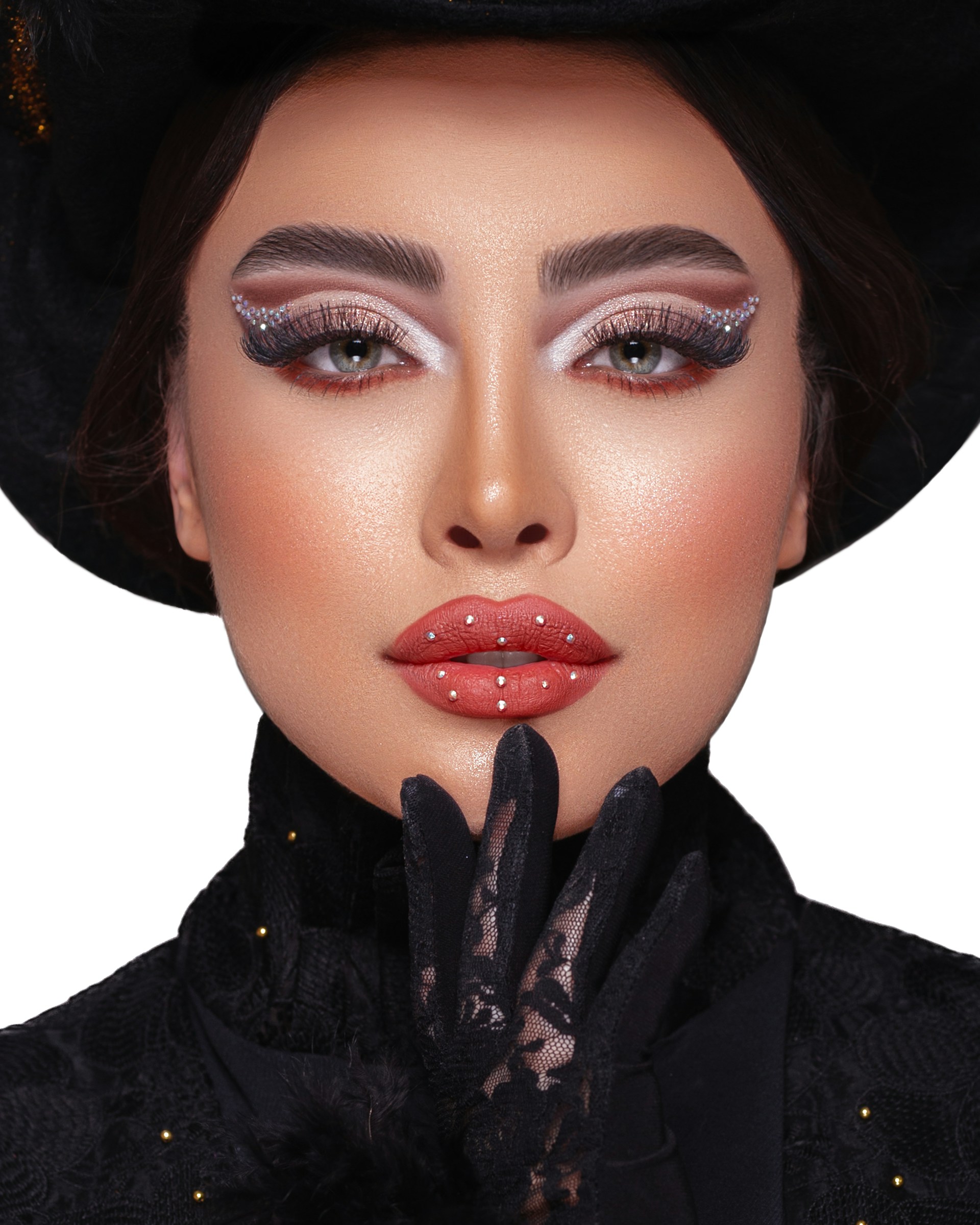 a woman wearing a black hat and gloves