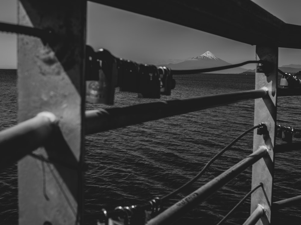 a black and white photo of a boat in the water