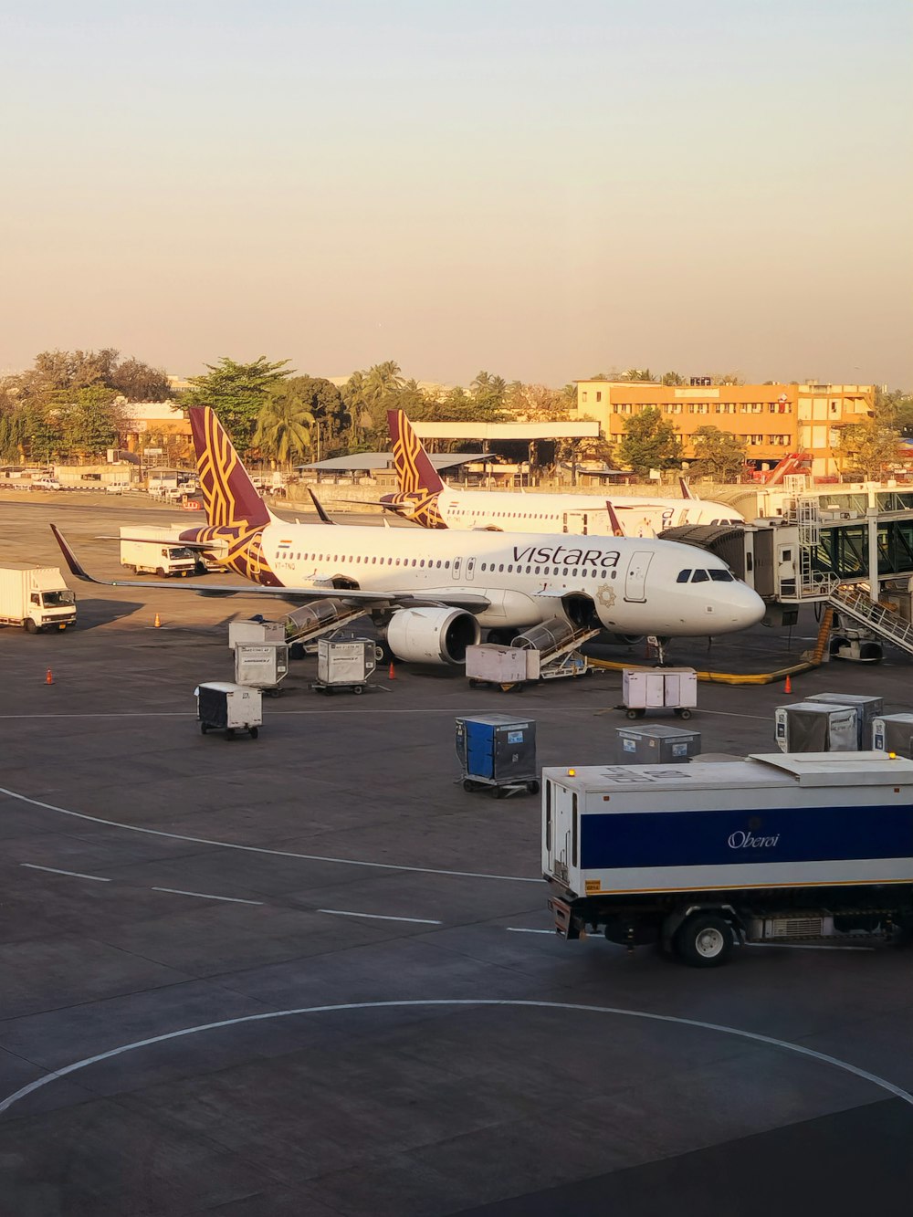 a large jetliner sitting on top of an airport tarmac