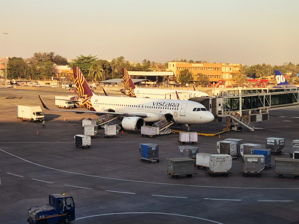 a large jetliner sitting on top of an airport tarmac