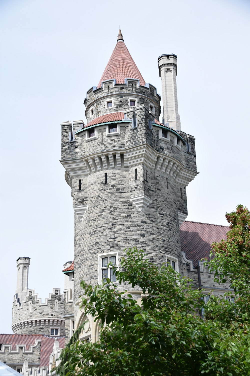 a large castle like building with a red roof