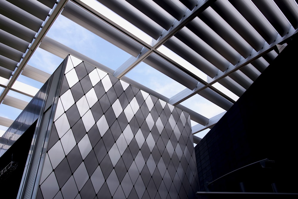 a close up of a building with a sky background