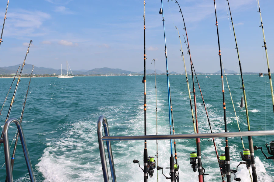 Multiple fishing rods rigged and ready on a charter boat
