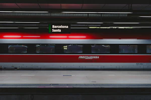 Train waiting at a railway station platform