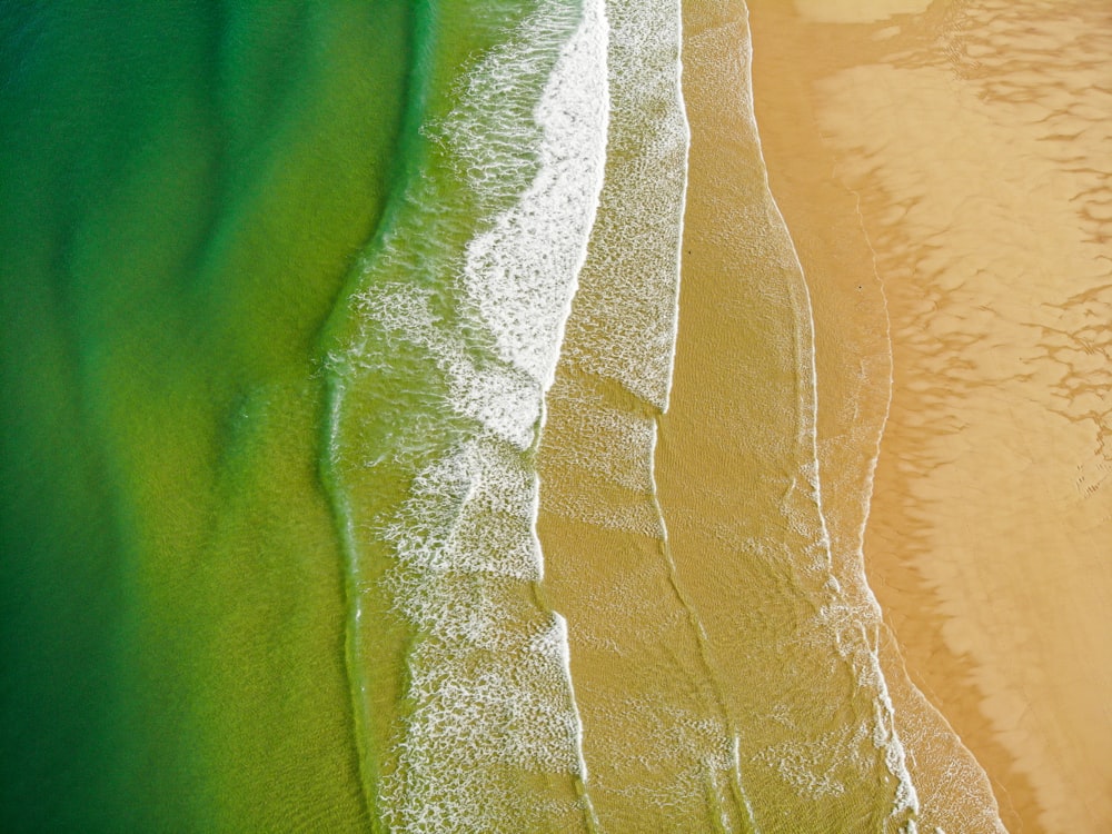 a bird's eye view of a sandy beach