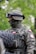 a man in a military uniform with a helmet and goggles on