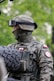a man in a military uniform with a helmet and goggles on