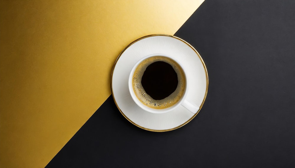 a cup of coffee sitting on top of a saucer