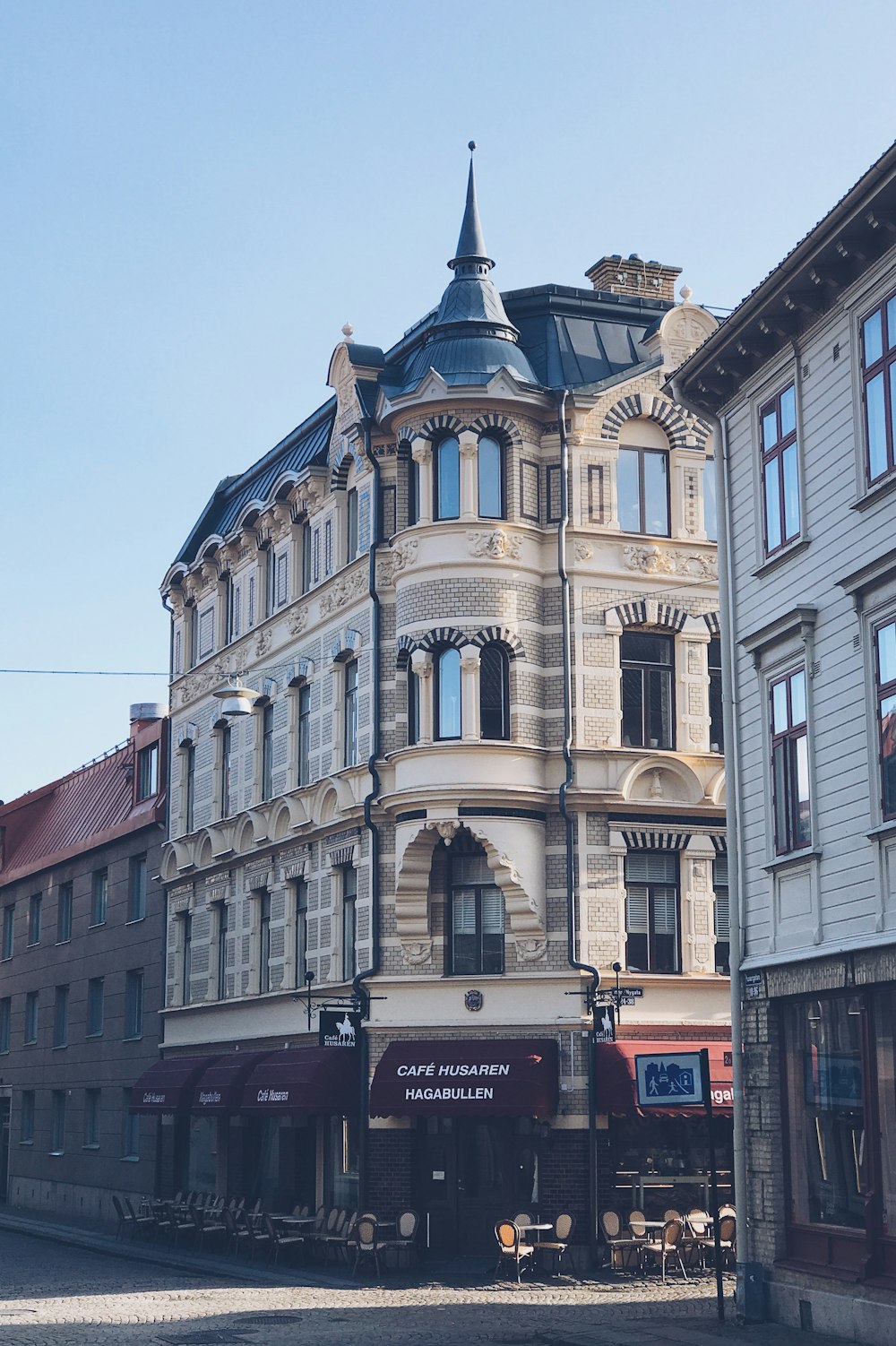 a large building with a clock on the top of it