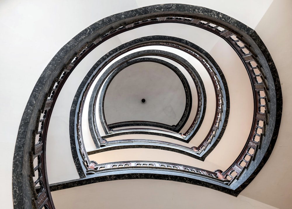 a circular mirror reflecting the inside of a building