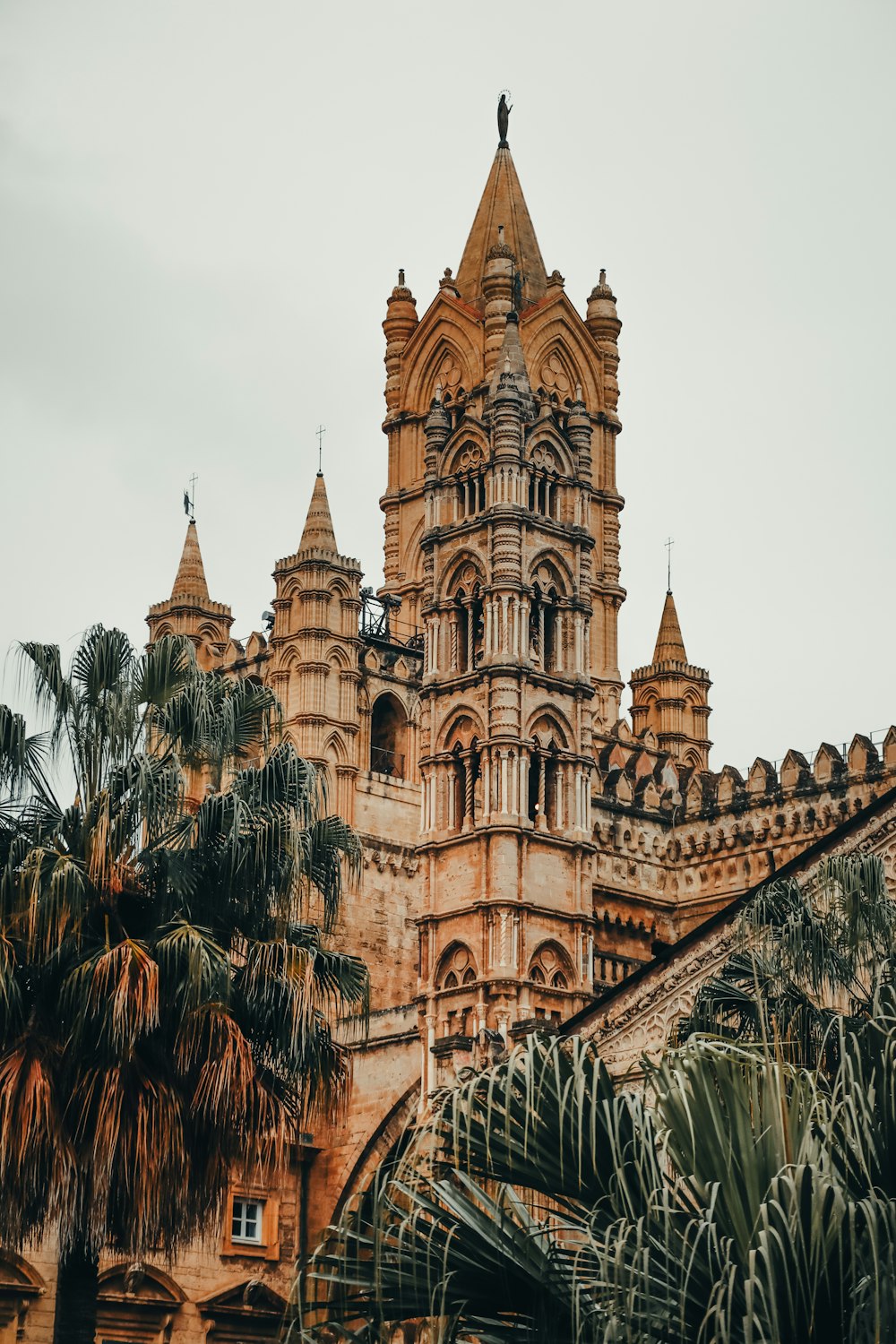 a very tall building with a clock on it's side